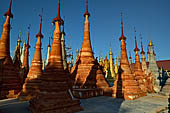 Inle Lake Myanmar. Indein, on the summit of a hill the  Shwe Inn Thein Paya a cluster of hundreds of ancient stupas. Many of them are ruined and overgrown with bushes. 